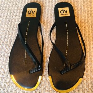 New Dolce Vita Black and Gold Flip Flops